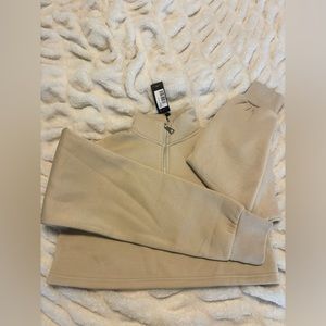 Size M pretty little thing “cropped stone high neck zip up”